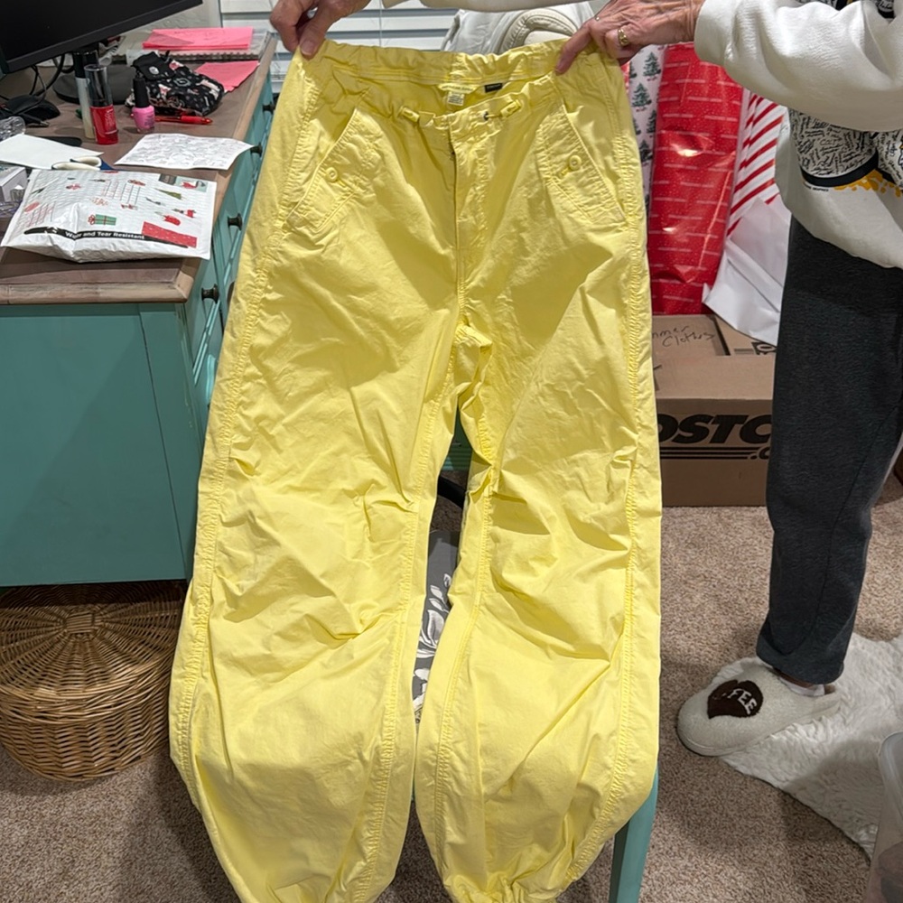 Brand New Never worn .American Eagle Small parachute pants in yellow